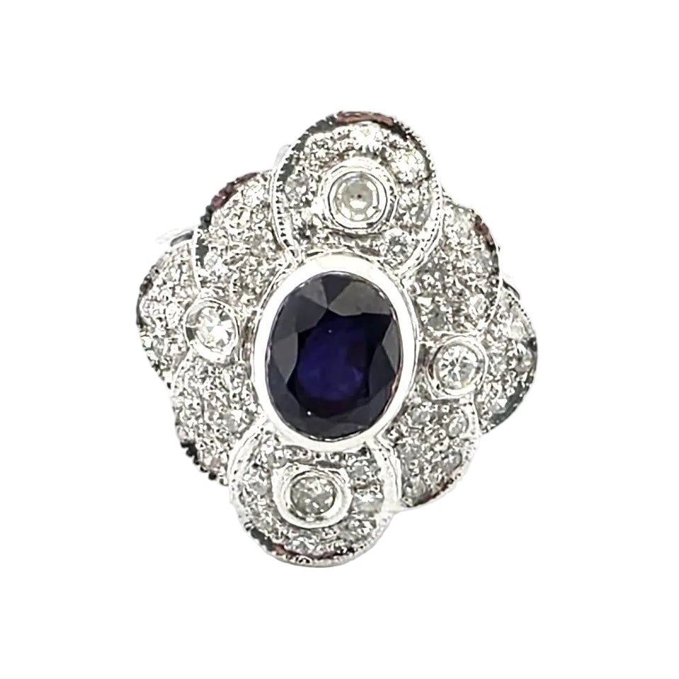 Bague Entourage en or blanc, saphir et diamants - Castafiore