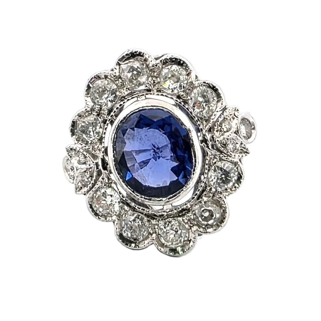 Bague Entourage en or blanc, saphir et diamants - Castafiore