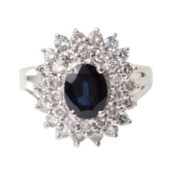 Bague entourage en or blanc, saphir ovale et diamants - Castafiore