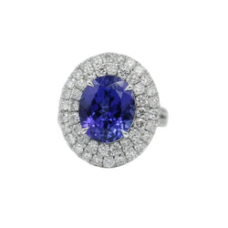 Bague Entourage en or blanc, tanzanite et diamants - Castafiore