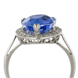 Bague Entourage en or blanc, tanzanite et diamants - Castafiore