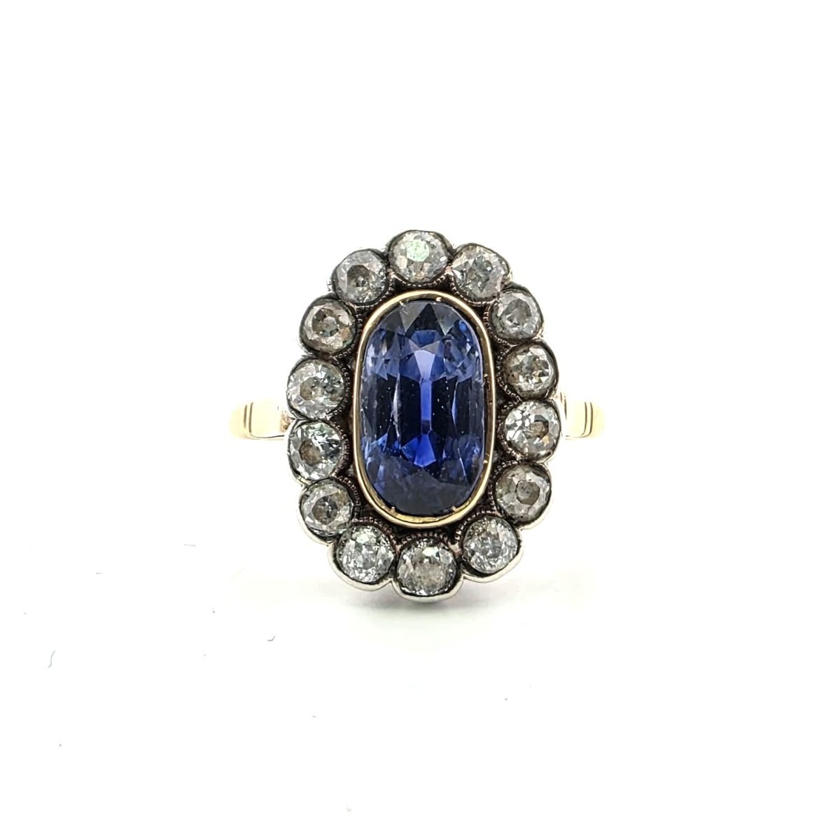 Bague Entourage en or jaune, argent, saphir et diamants - Castafiore