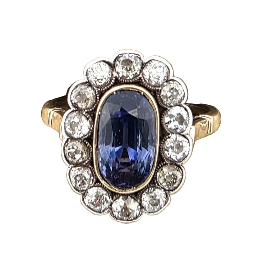 Bague Entourage en or jaune, argent, saphir et diamants - Castafiore