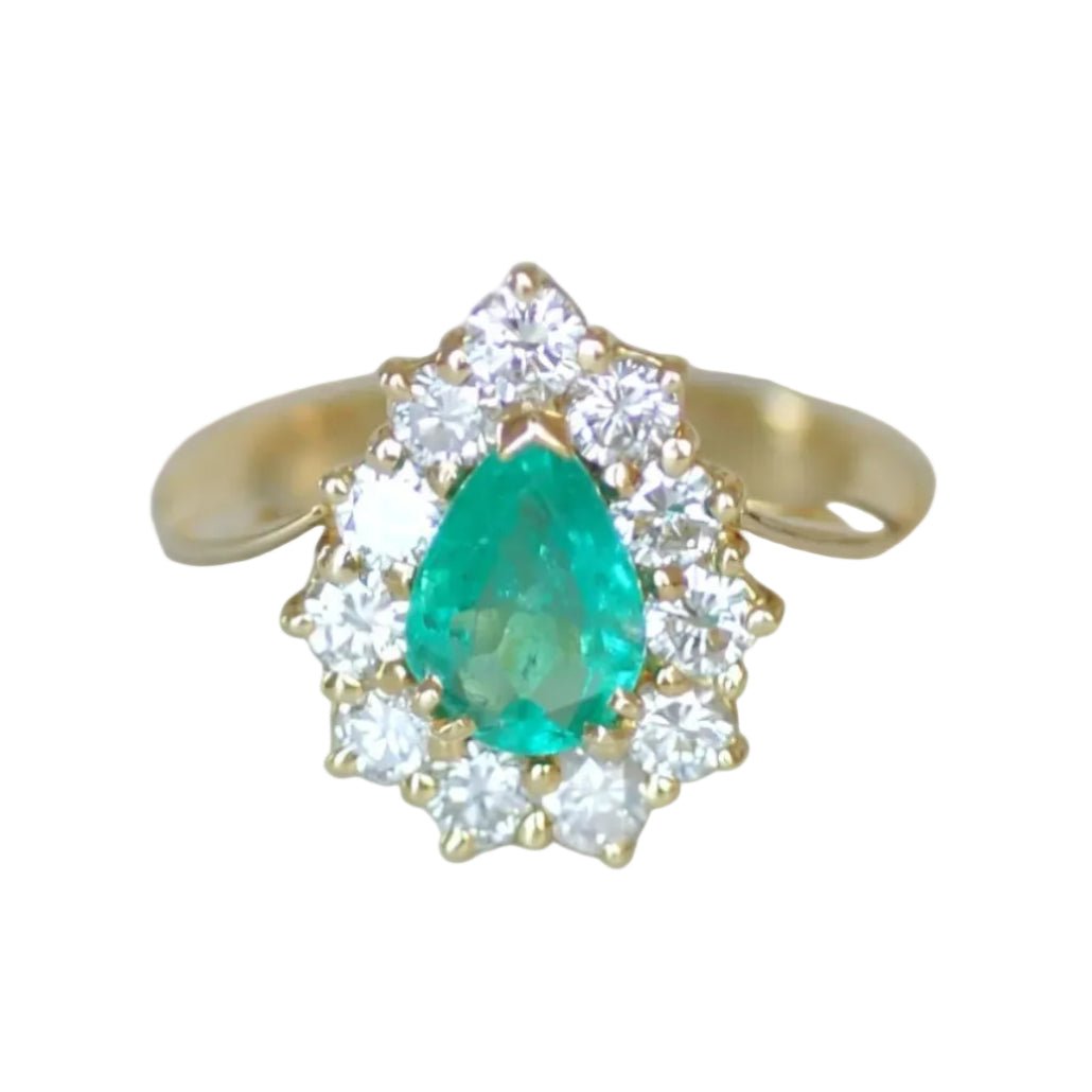 Bague Entourage en or jaune, émeraude et diamants - Castafiore