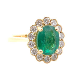 Bague Entourage en or jaune, émeraude et diamants - Castafiore