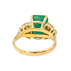Bague Entourage en or jaune, émeraude et diamants - Castafiore