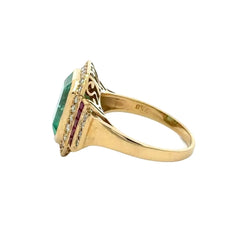 Bague Entourage en or jaune, émeraude, rubis et diamants - Castafiore