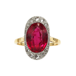 Bague Entourage en or jaune, or blanc, rubis et diamants