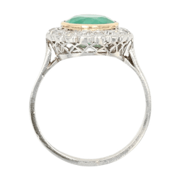 Bague Entourage en or jaune, platine, émeraude et diamants - Castafiore