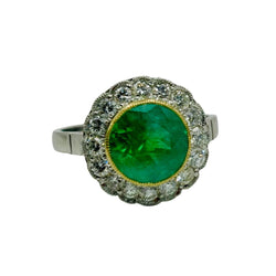 Bague Entourage en or jaune, platine, émeraude et diamants - Castafiore