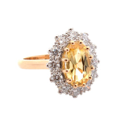 Bague Entourage en or jaune, platine, saphir, et diamants - Castafiore