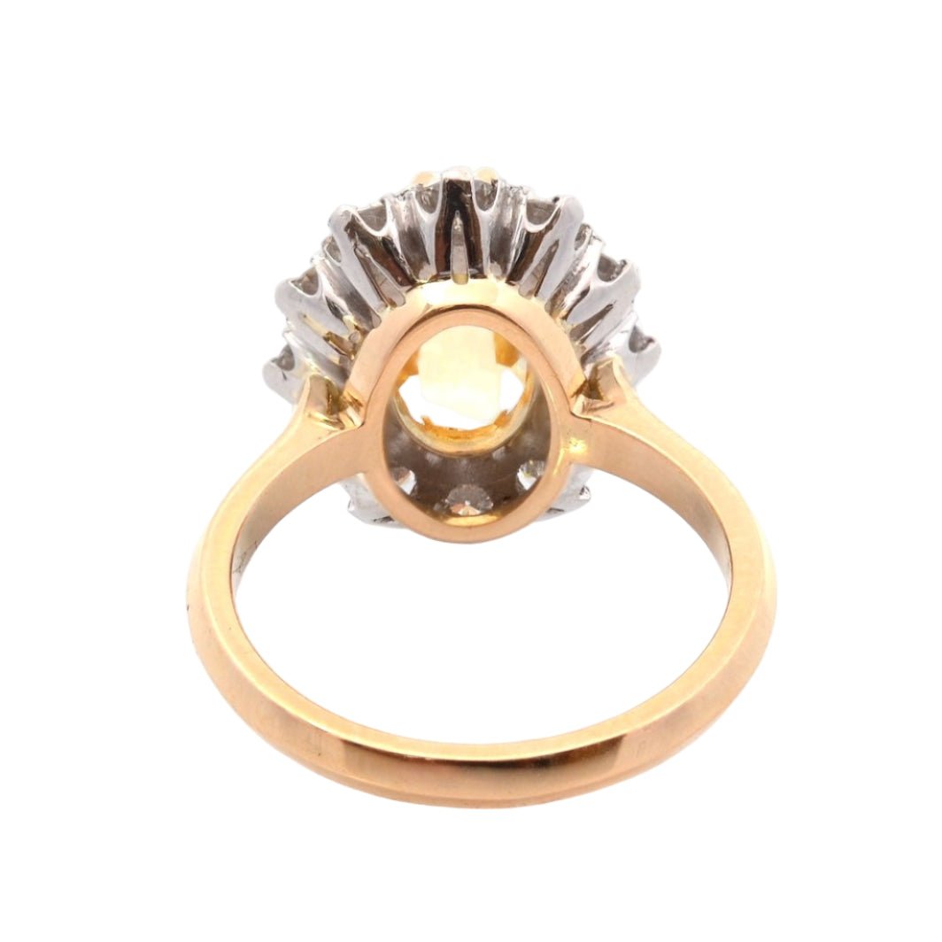 Bague Entourage en or jaune, platine, saphir, et diamants - Castafiore