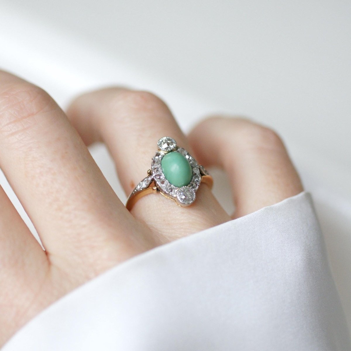 Bague Entourage en or jaune, platine, turquoise et diamants - Castafiore