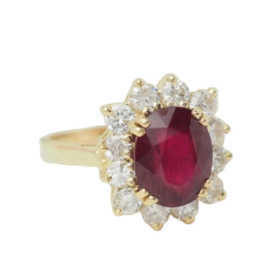 Bague entourage en or jaune rubis et diamants - Castafiore
