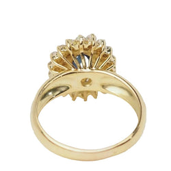 Bague Entourage en or jaune, saphir, et diamants - Castafiore