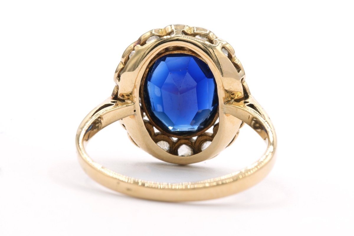 Bague Entourage en or jaune, saphir et diamants - Castafiore
