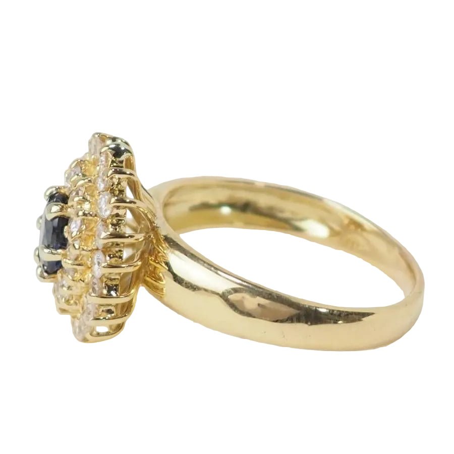 Bague Entourage en or jaune, saphir, et diamants - Castafiore