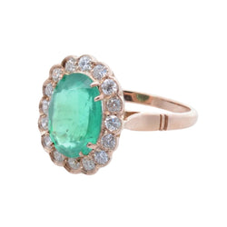 Bague Entourage en or rose, émeraude et diamants - Castafiore