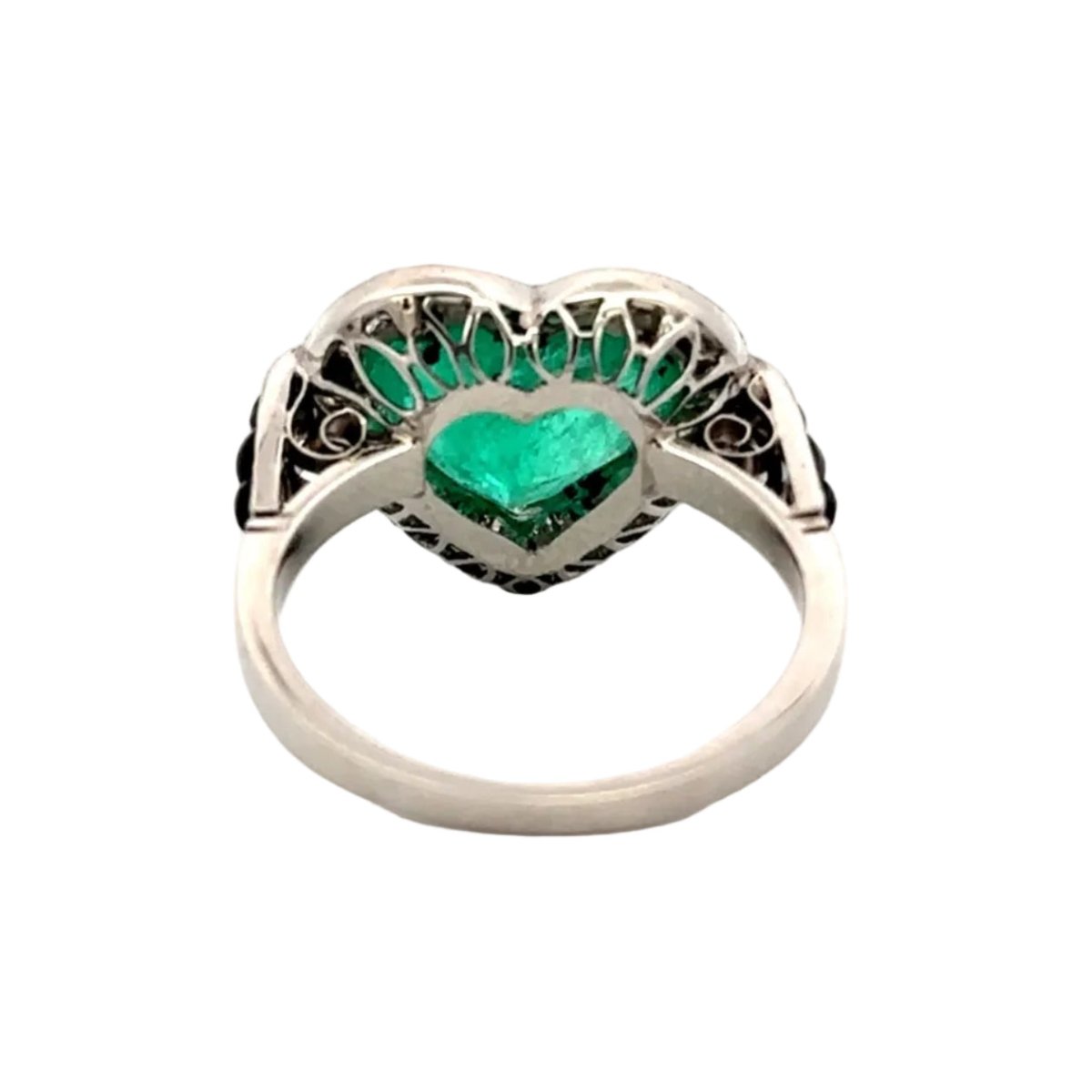 Bague Entourage en platine, émeraude, onyx et diamants - Castafiore