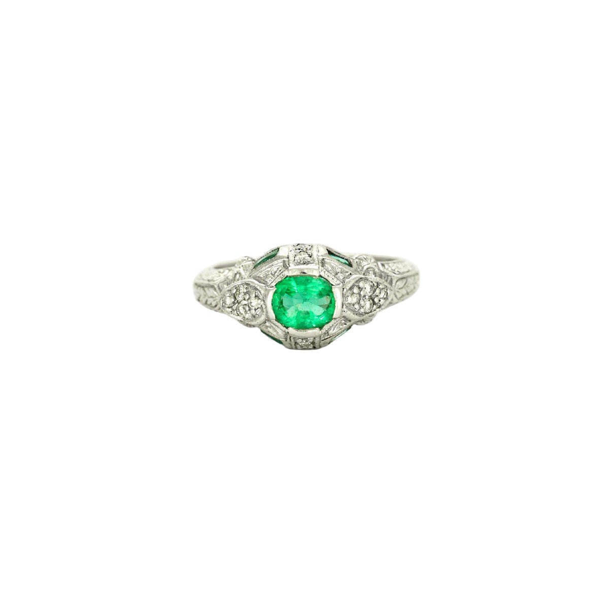 Bague Entourage en platine, émeraudes, et diamants - Castafiore