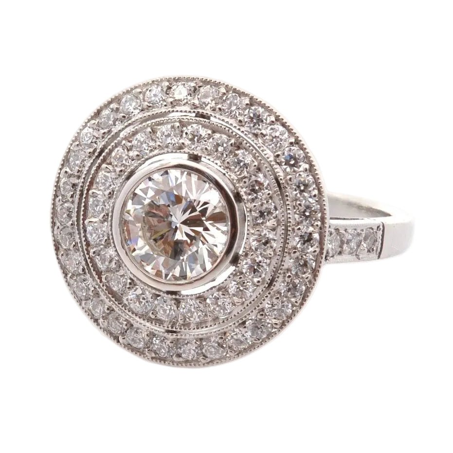Bague Entourage en platine et diamants - Castafiore