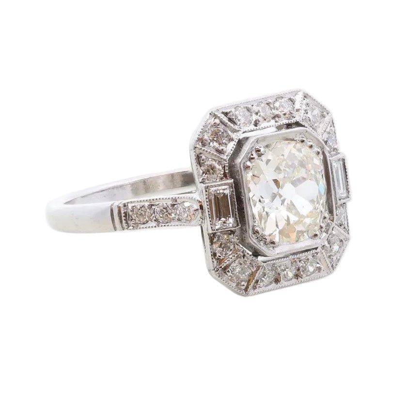 Bague Entourage en platine et diamants - Castafiore