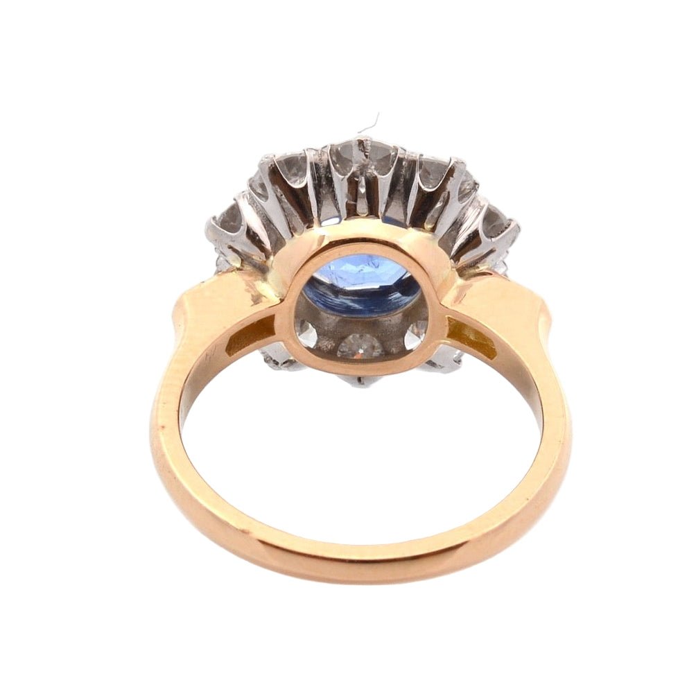 Bague Entourage en platine, or, saphir, et diamants - Castafiore