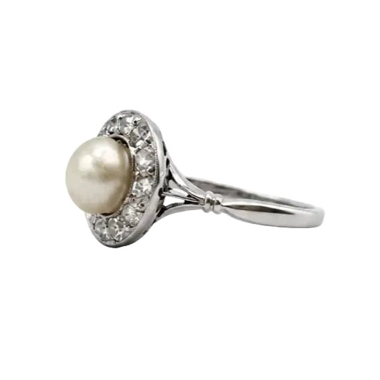 Bague Entourage en platine, perle et diamants - Castafiore