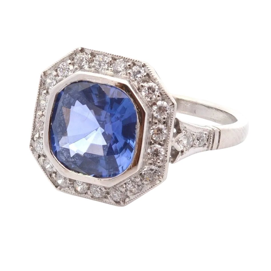 Bague Entourage en platine, saphir et diamants - Castafiore