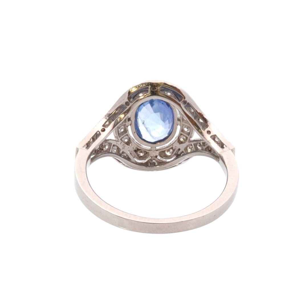 Bague Entourage en platine, saphir, et diamants - Castafiore