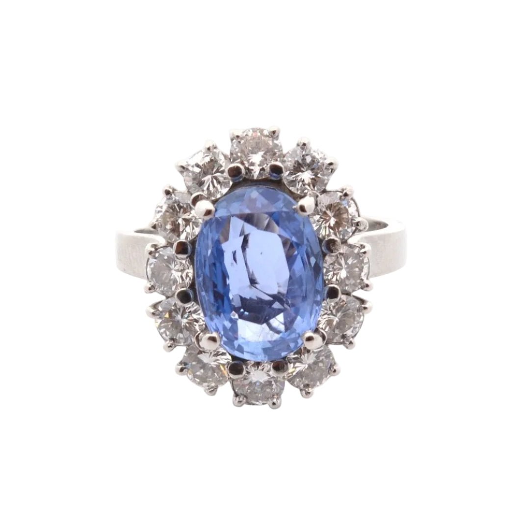 Bague Entourage en platine, saphir et diamants - Castafiore