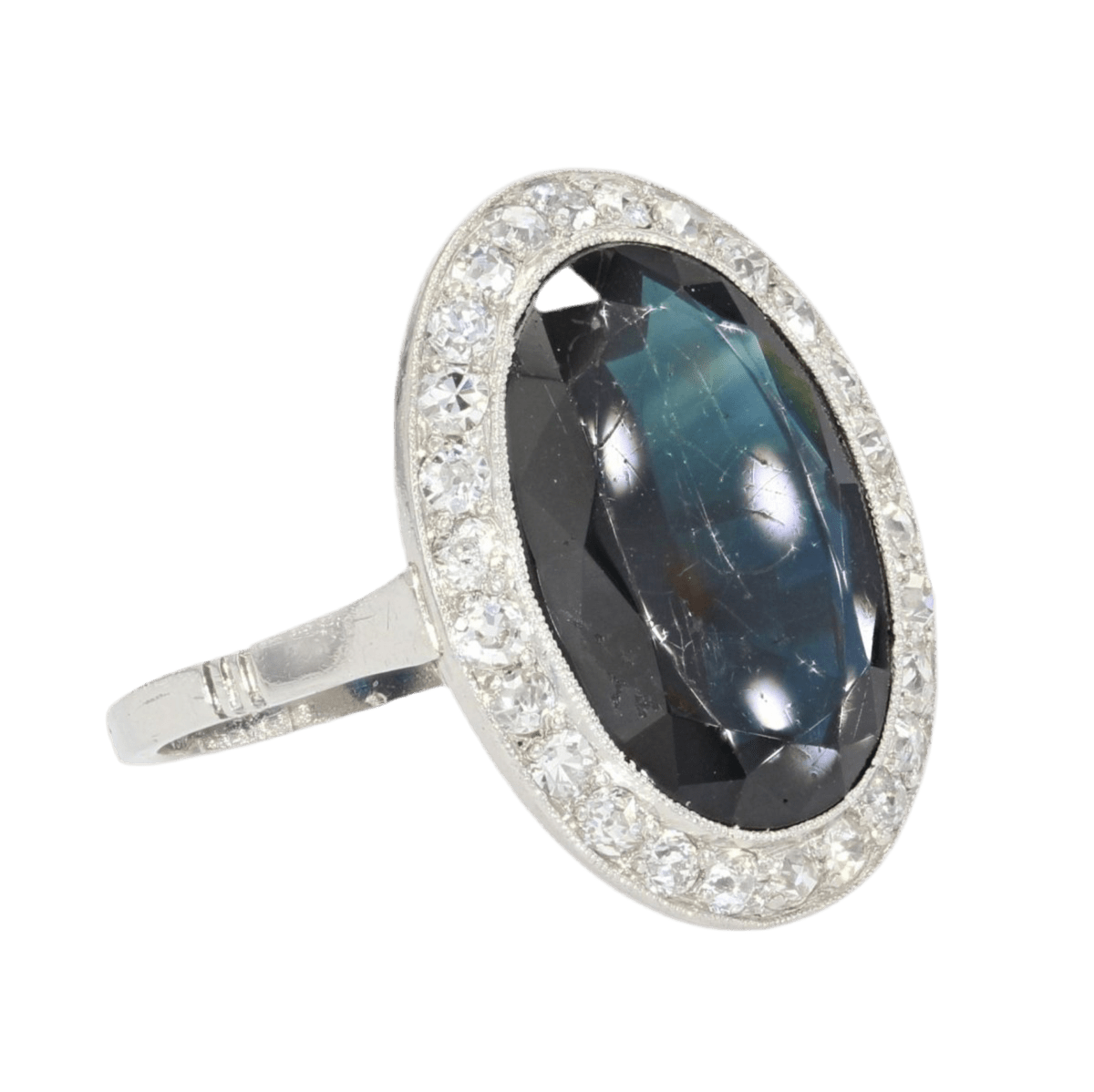 Bague Entourage en platine, saphir et diamants - Castafiore