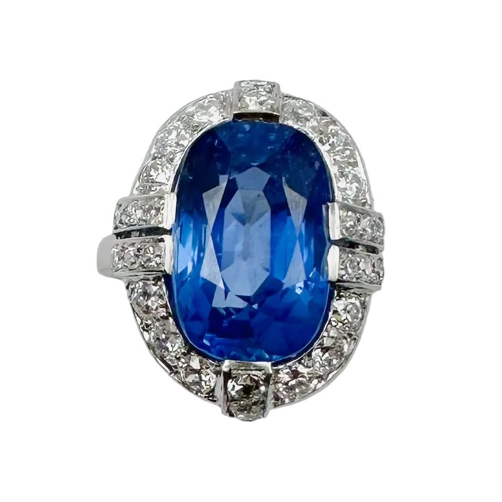 Bague Entourage en platine, saphir et diamants - Castafiore