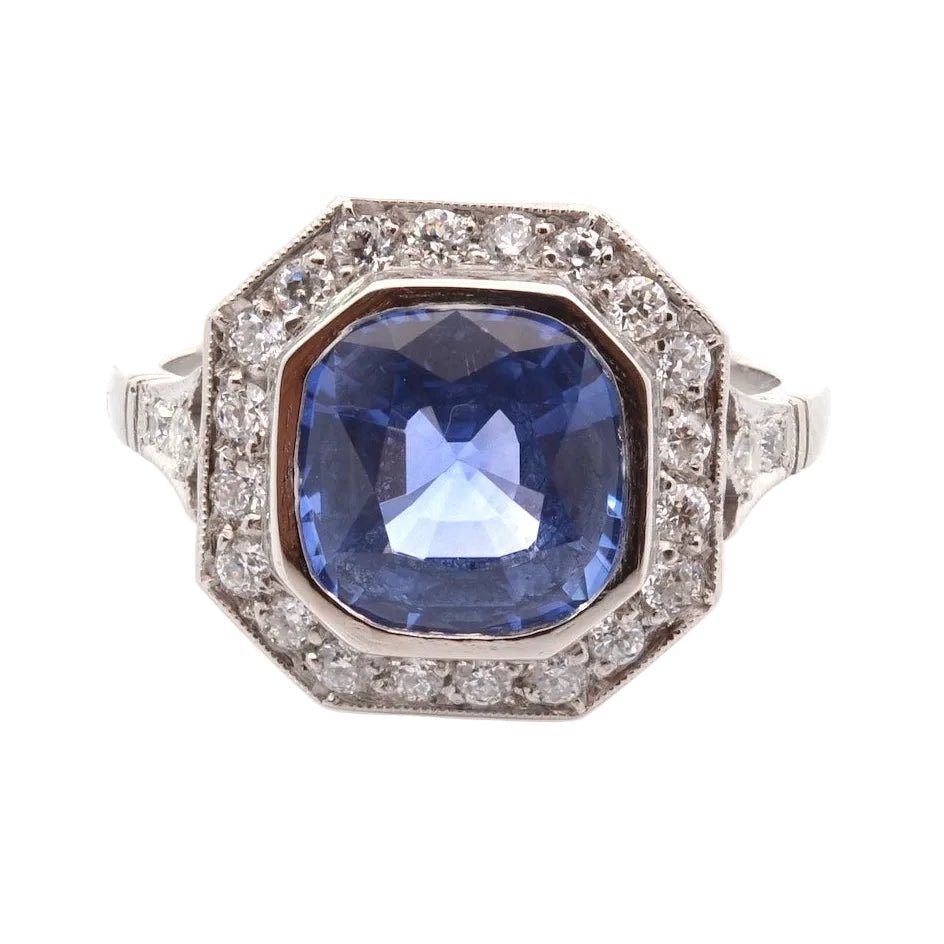 Bague Entourage en platine, saphir et diamants - Castafiore