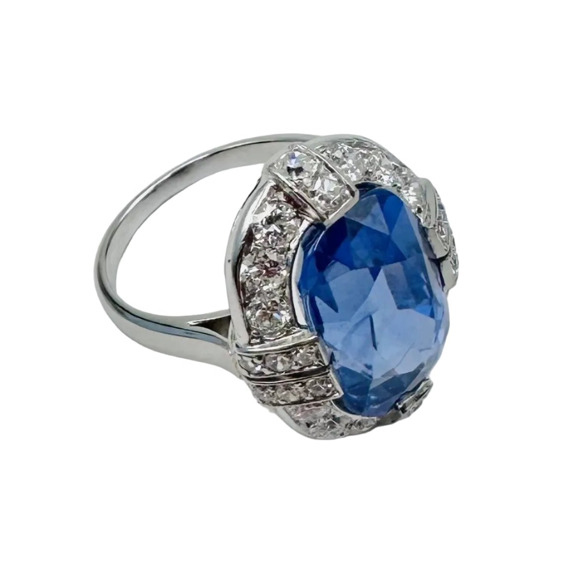 Bague Entourage en platine, saphir et diamants - Castafiore