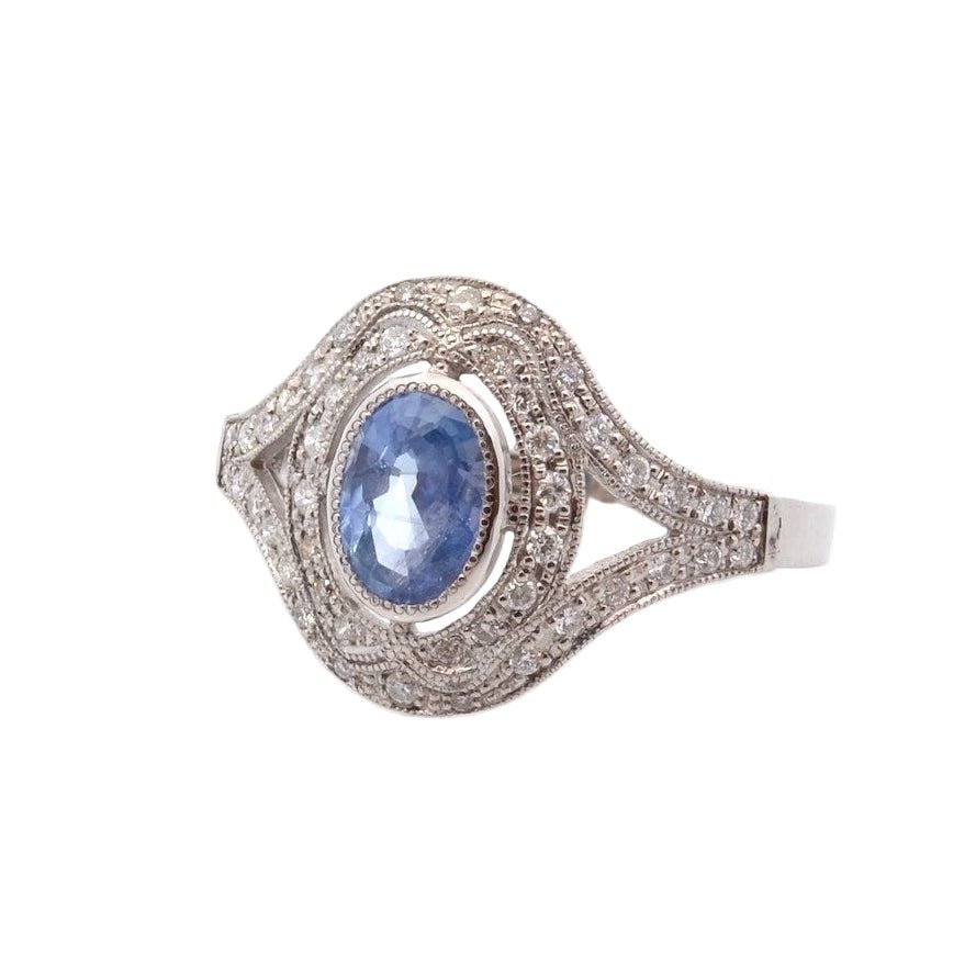 Bague Entourage en platine, saphir, et diamants - Castafiore