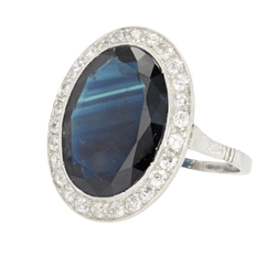 Bague Entourage en platine, saphir et diamants - Castafiore