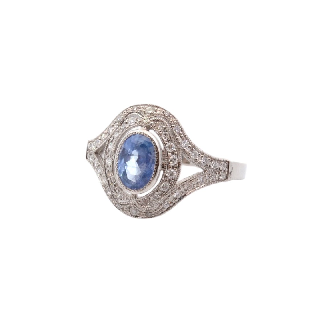 Bague Entourage en platine, saphir, et diamants - Castafiore