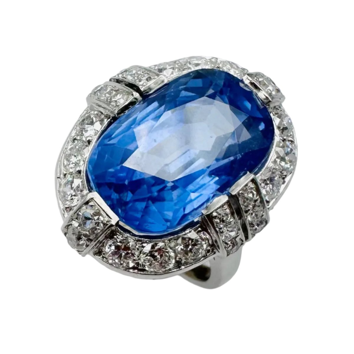 Bague Entourage en platine, saphir et diamants - Castafiore