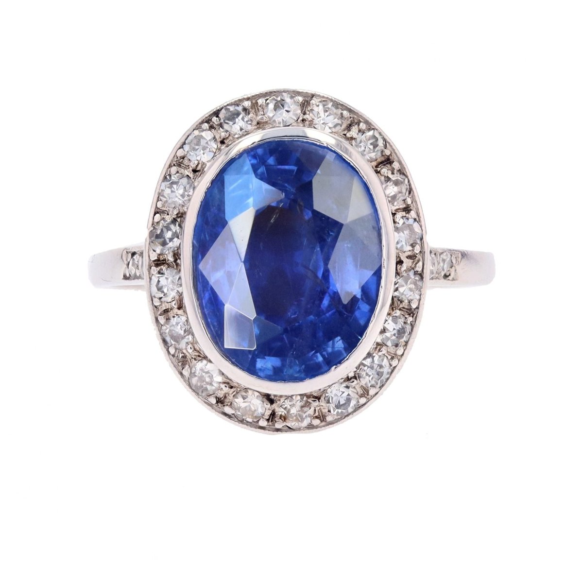 Bague Entourage en platine, saphir et diamants - Castafiore