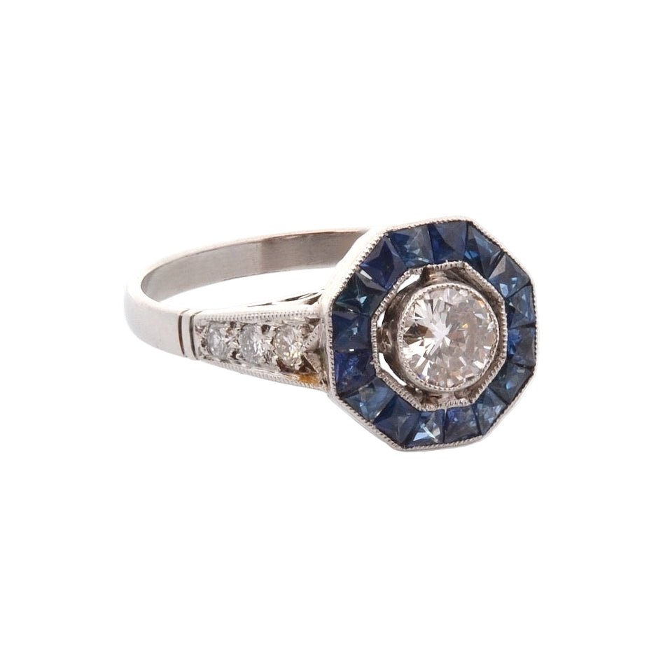 Bague Entourage en platine, saphirs, et diamants - Castafiore
