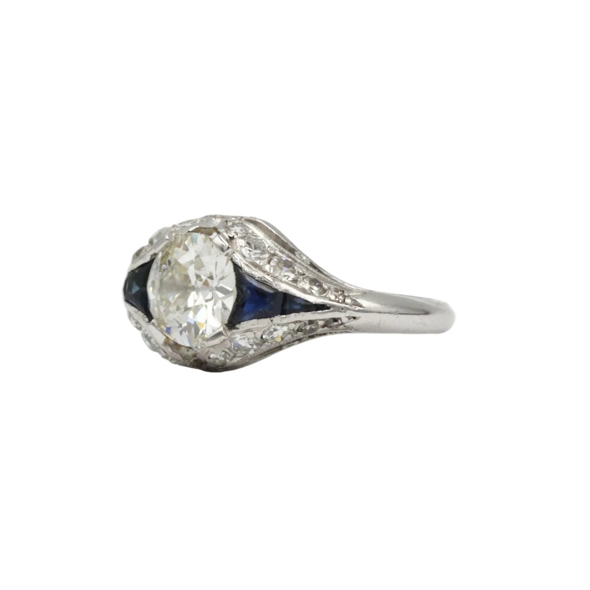 Bague Entourage en platine, saphirs et diamants - Castafiore