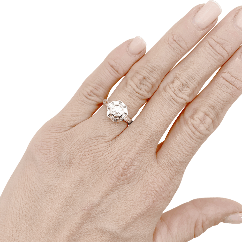 Bague Entourage MELLERIO en platine et diamants - Castafiore