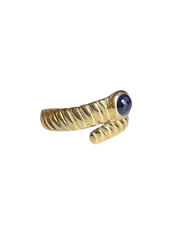 Bague godronnée en or jaune 18 carats sertie d'un saphir - Castafiore