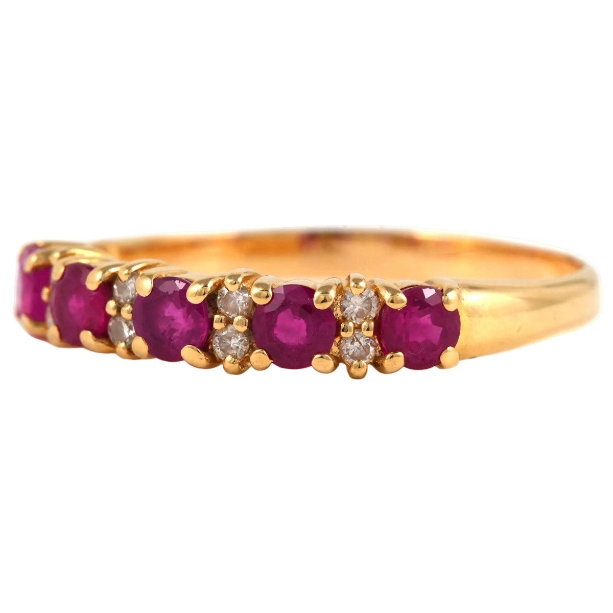 Bague Jarretière en or jaune, rubis et diamants - Castafiore