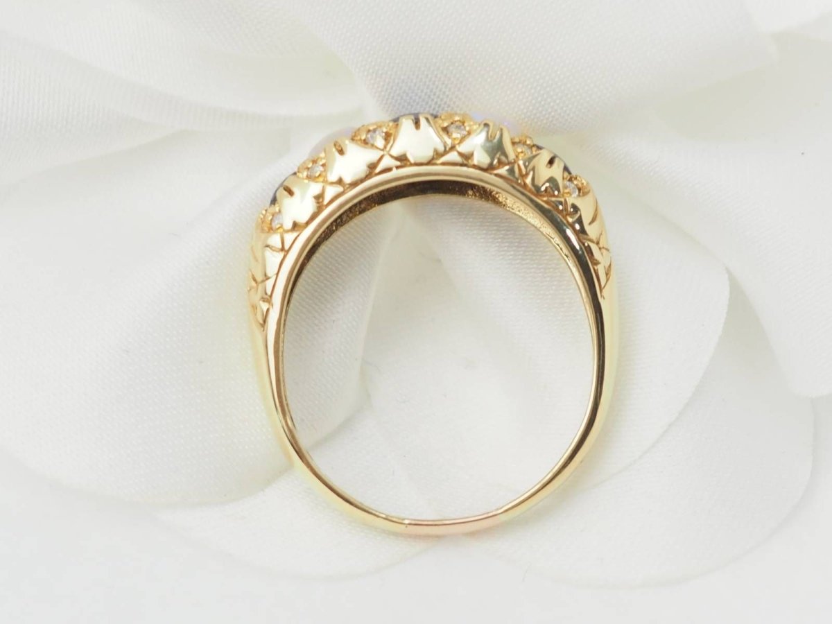 Bague jarretière en or jaune, saphirs et pierres de lune - Castafiore