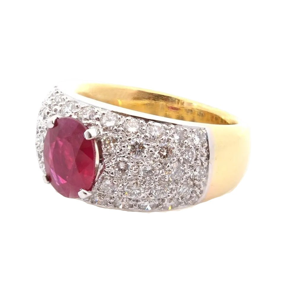 Ring rubies and diamonds in gold and paltinium