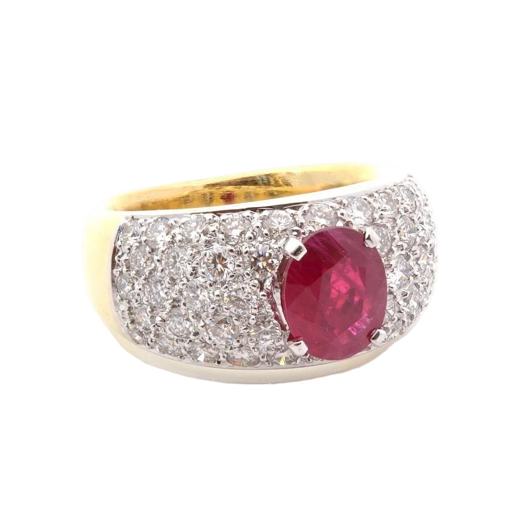 Ring rubies and diamonds in gold and paltinium