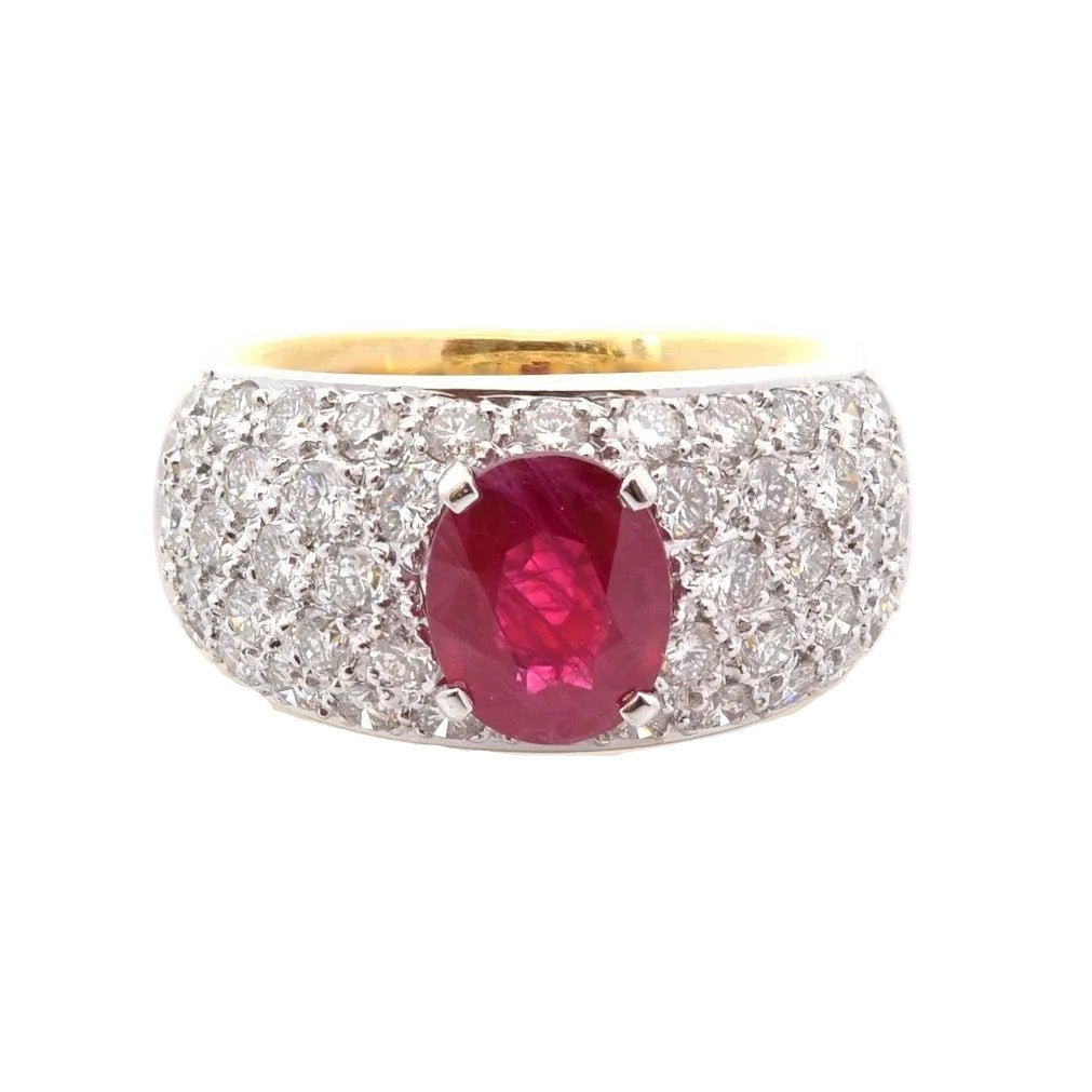 Ring rubies and diamonds in gold and paltinium