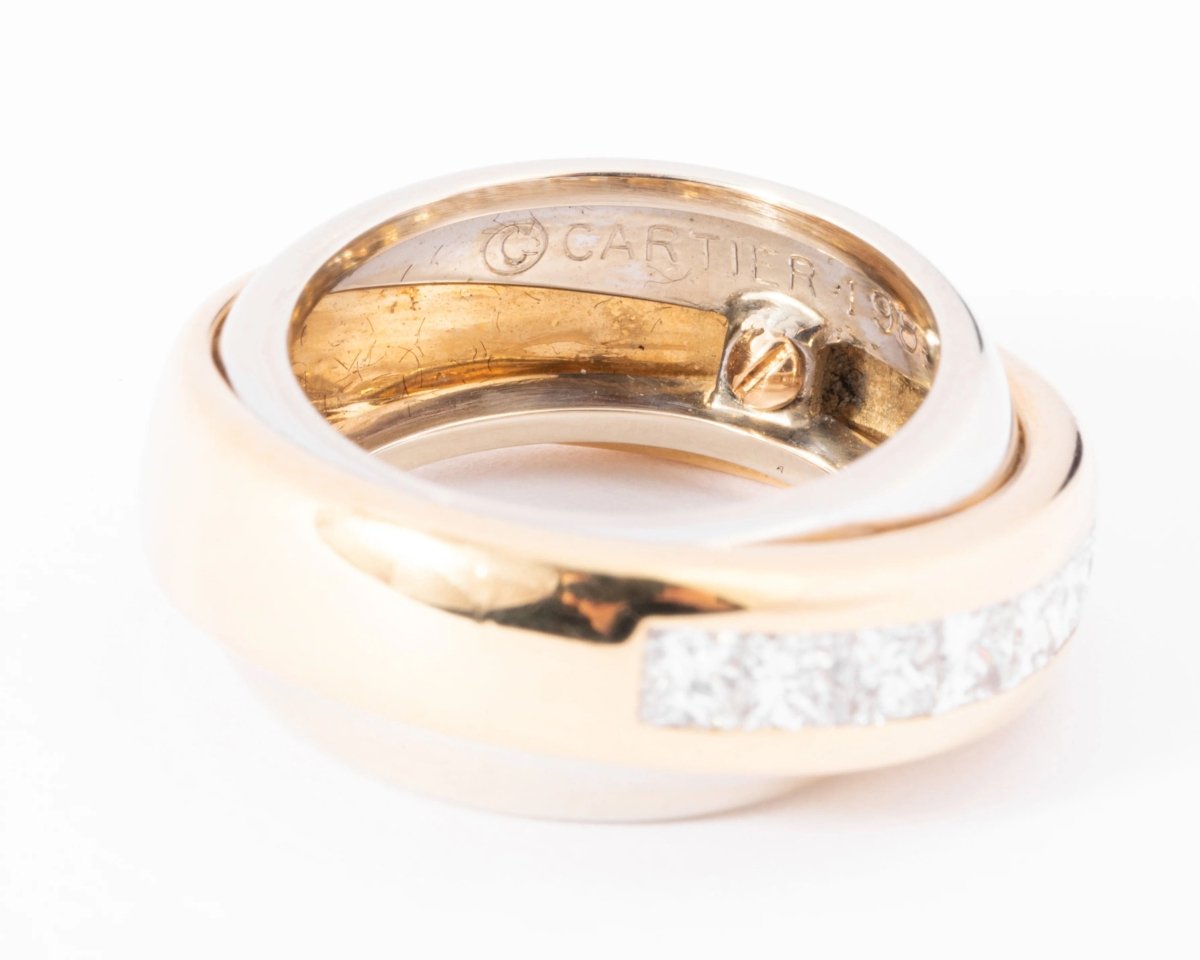 Bague jonc signée Cartier bi-colore en diamants princesses - Castafiore